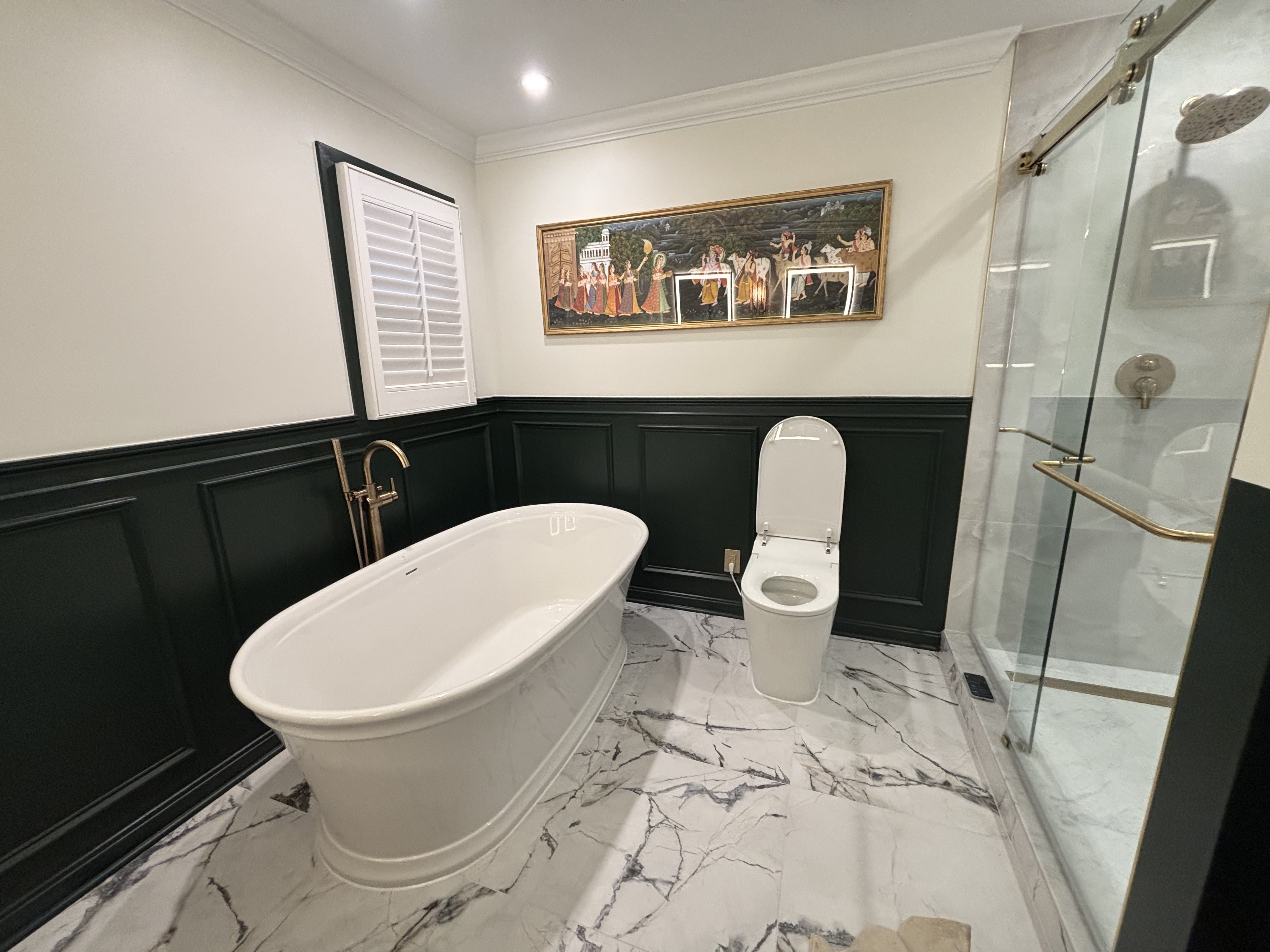 Freestanding tub, smart toilet and glass walk-in shower, alternate angle