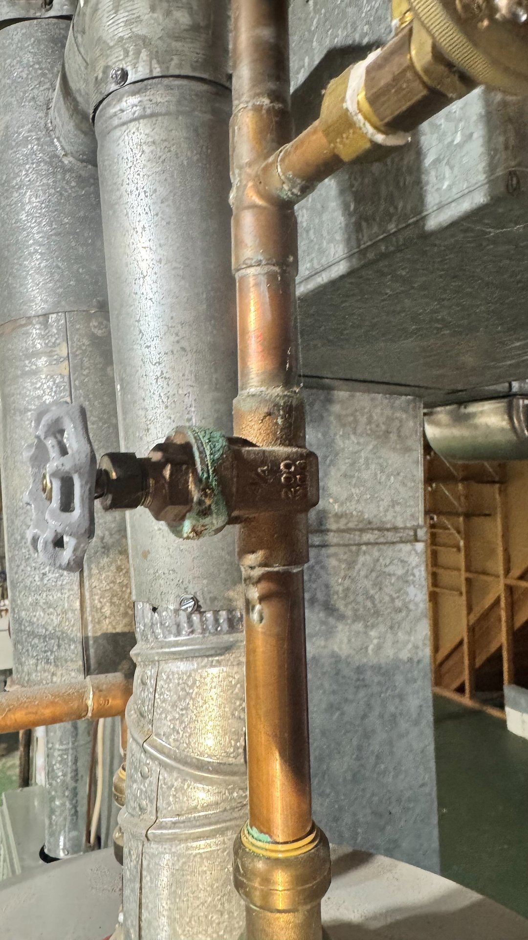 Copper water line and shutoff valve installed during whole-home plumbing work in Virginia