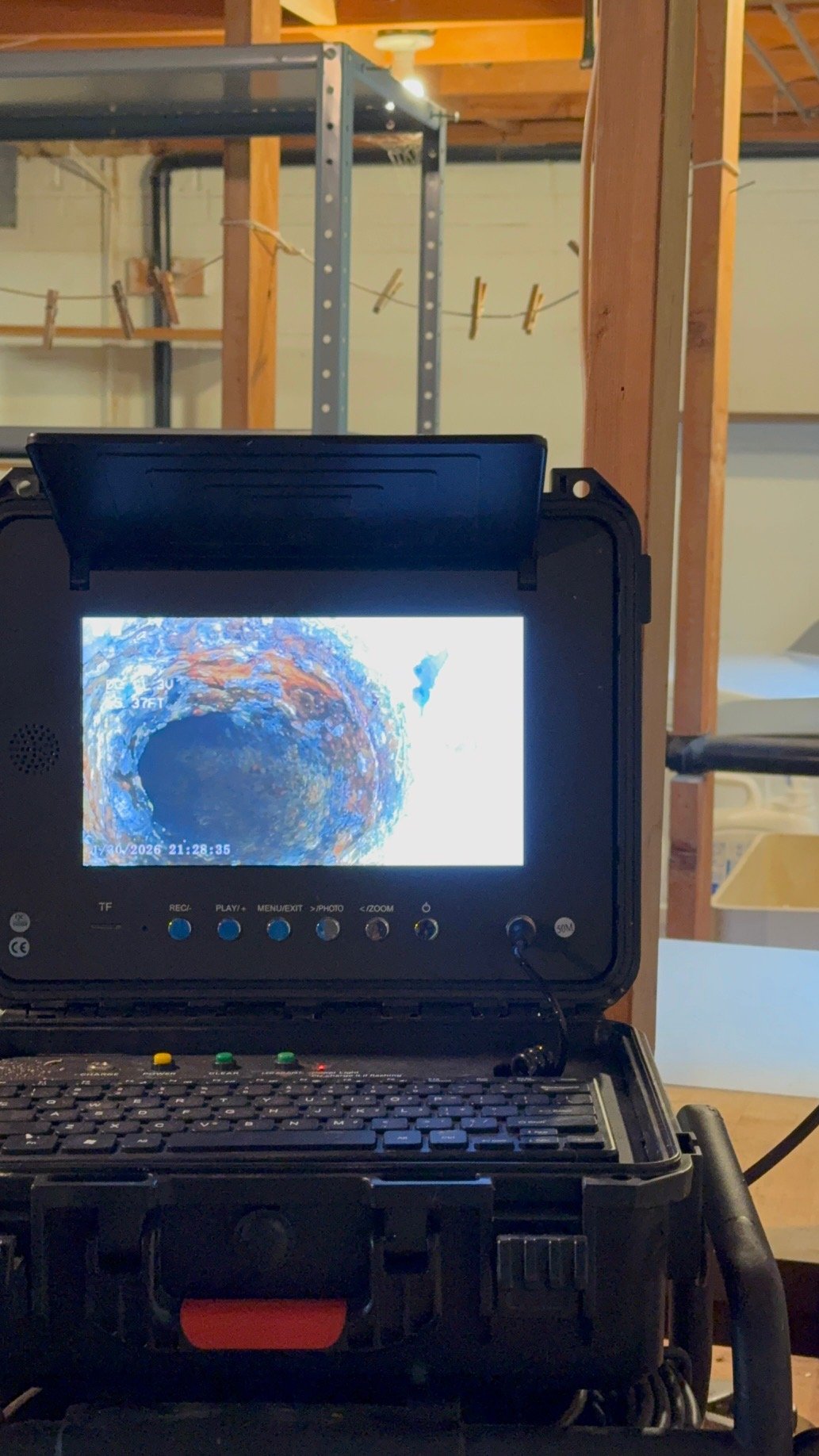 Sewer camera monitor showing the inside of a sewer pipe during inspection in McLean, VA