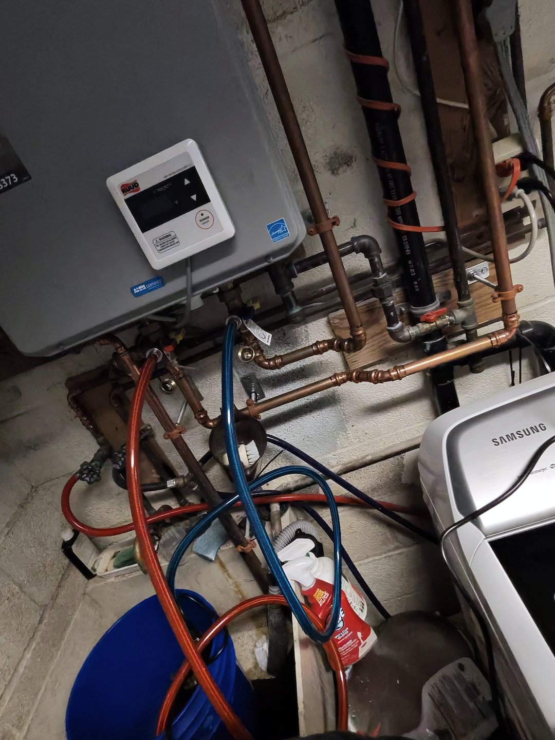 Tankless water heater connected for annual maintenance flush in Northern Virginia
